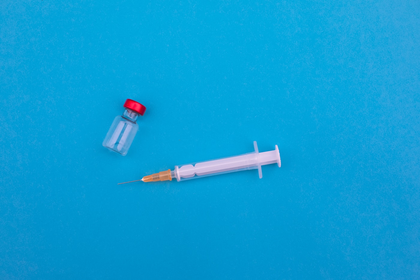 red and white pen on green textile